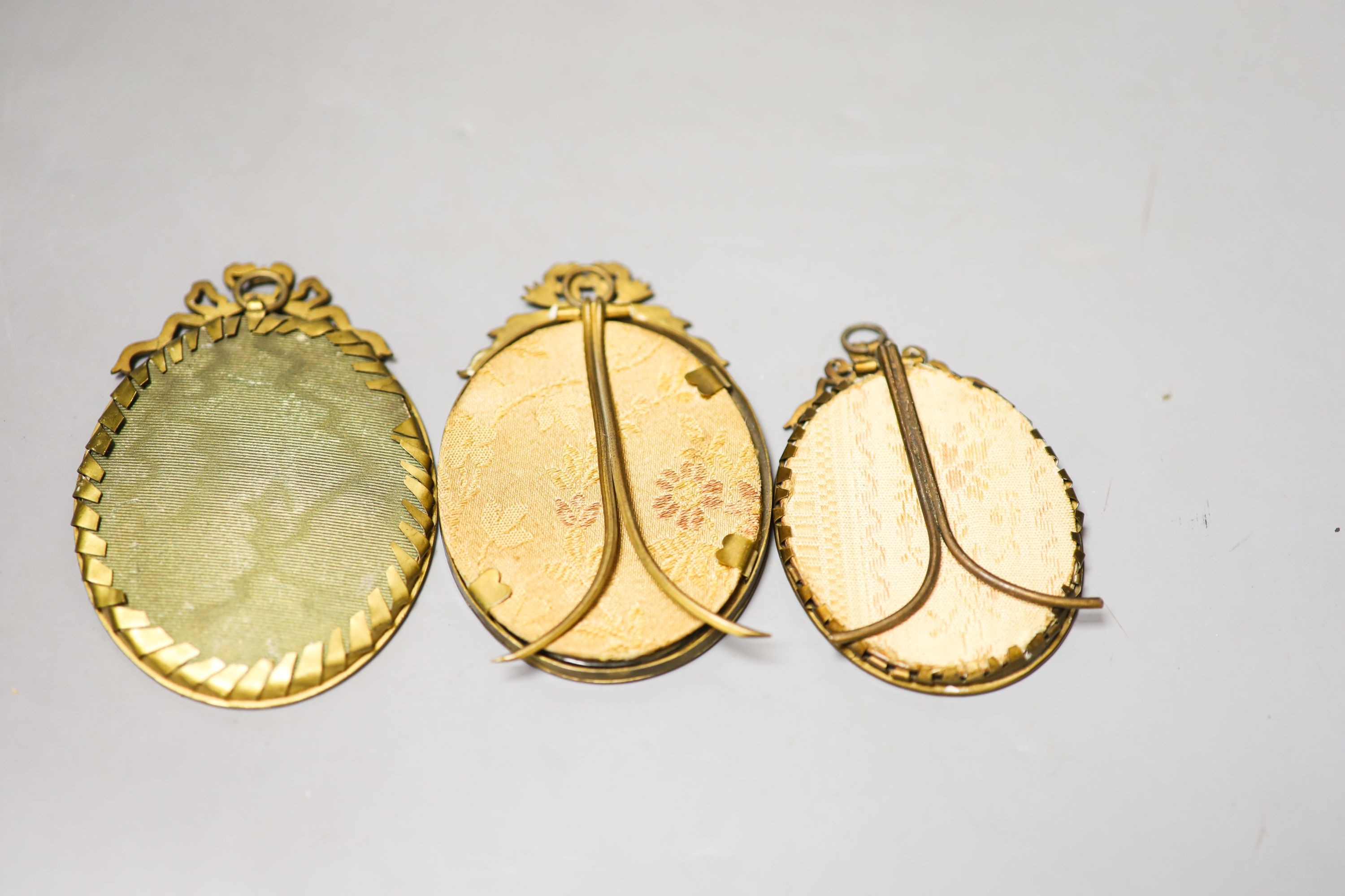 Three miniatures of ladies on ivory, early 20th century and a soapstone lidded pot and enamelled box